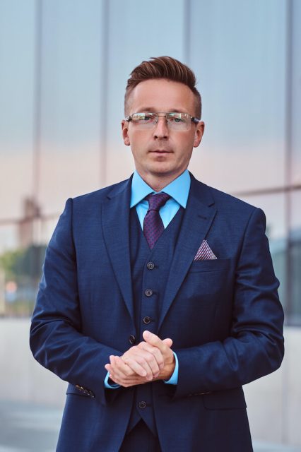 confident-businessman-dressed-in-an-elegant-suit-s-2021-04-04-04-42-35-utc.jpeg